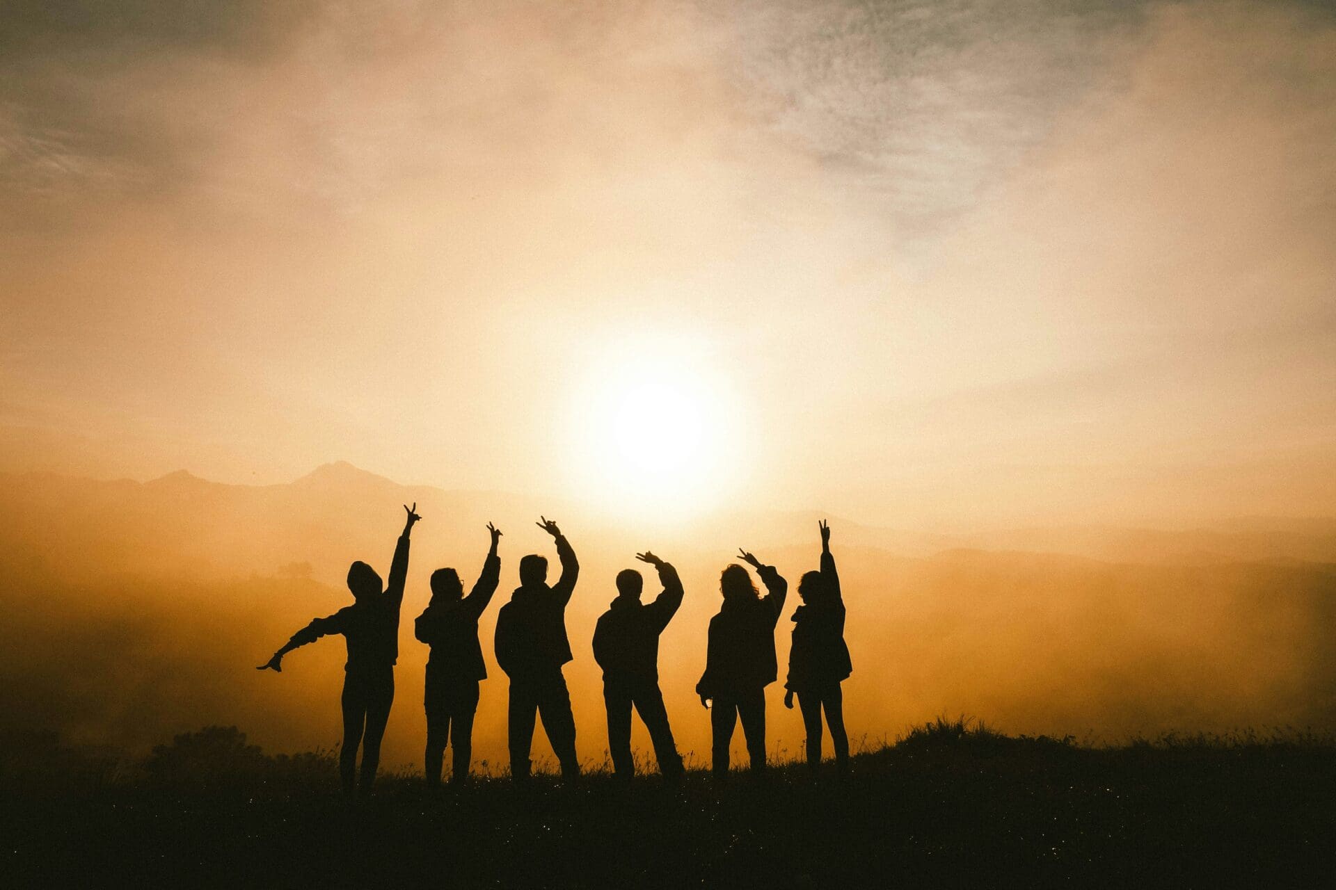Group of people celebrating milestones in their recovery journey.